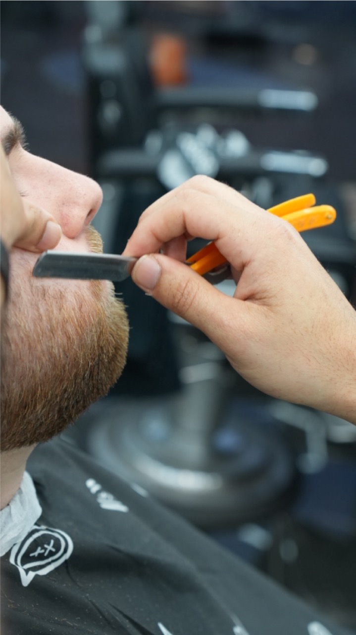 Cut-throat razor beard line-up close up