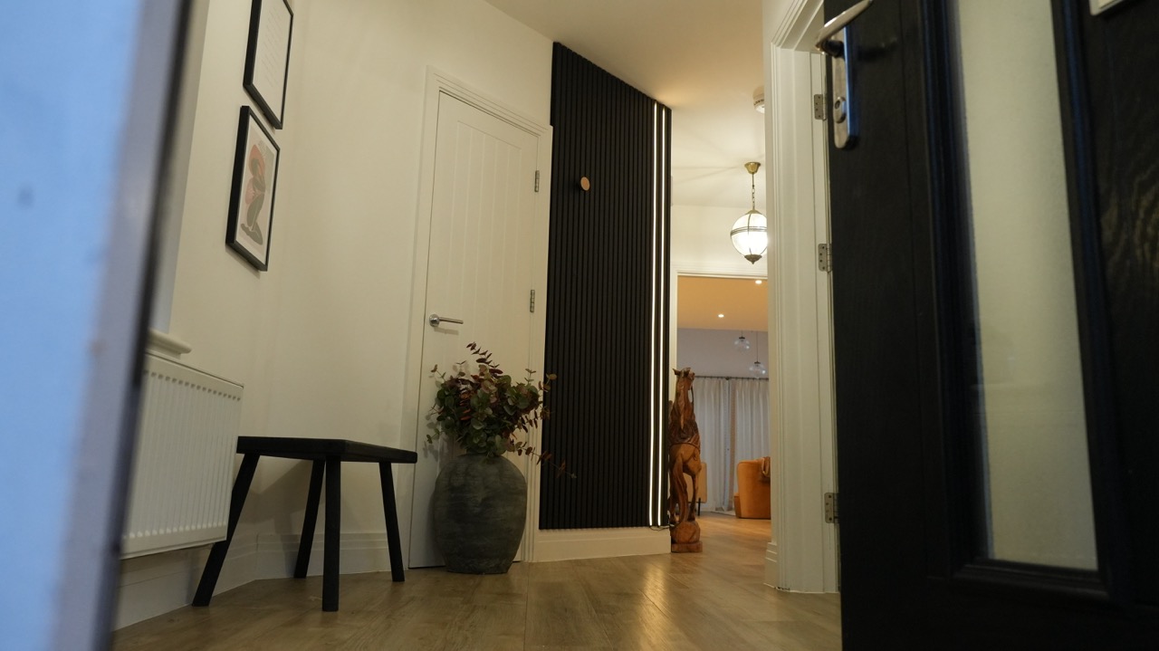 Entrance hallway with slatted feature wall and LED lighting, Milton Keynes