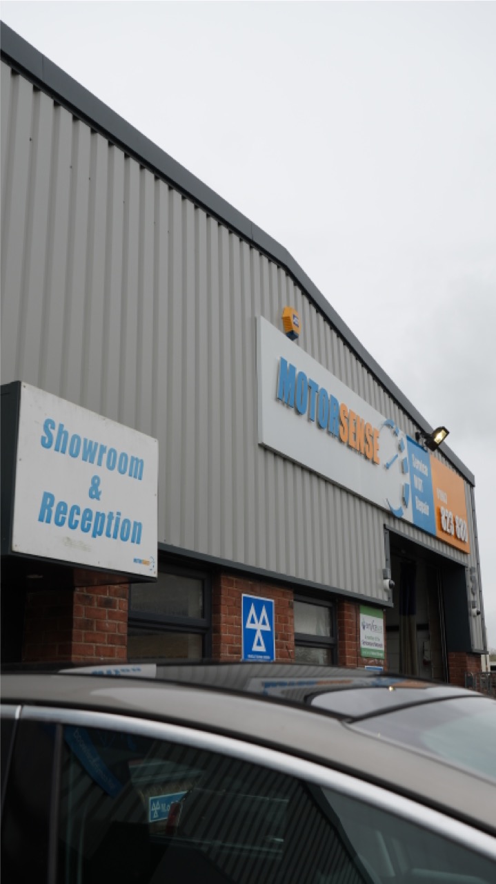 Motor Sense showroom and workshop exterior signage in Worthing