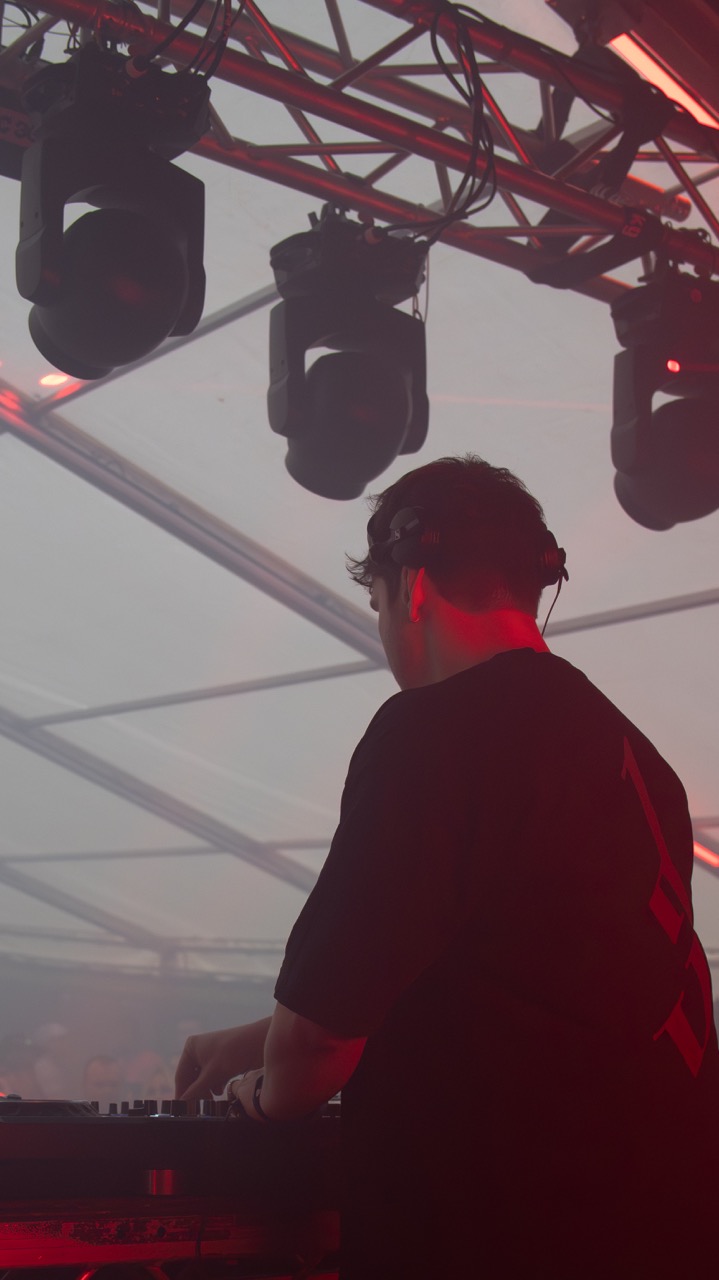 Grafix performing in red stage haze